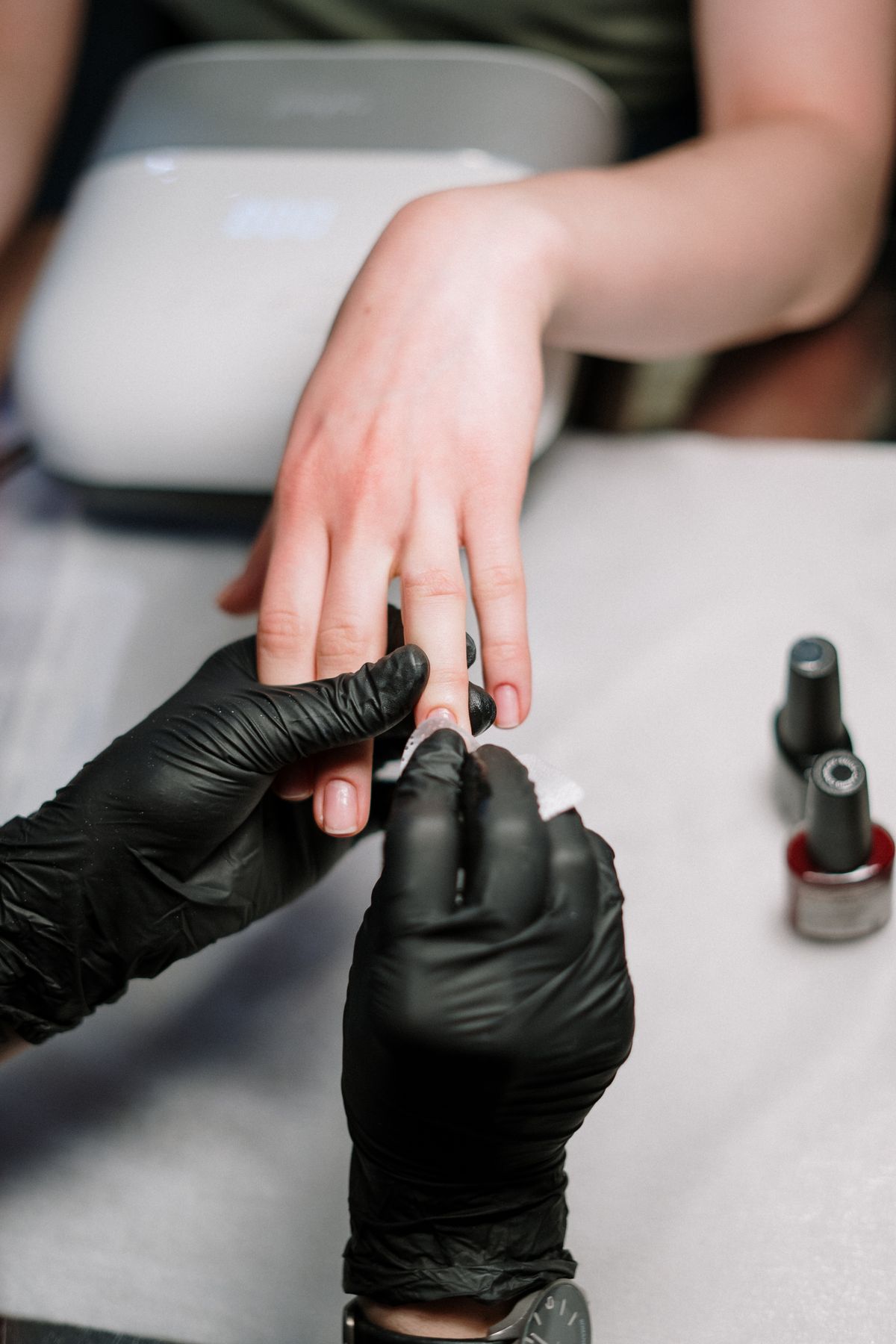 Gel manicure in progress at The Sauce, Southfield